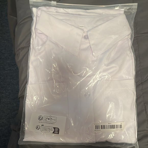 Brand new white collared shirt. Size runs small. More like a large - Picture 3 of 3